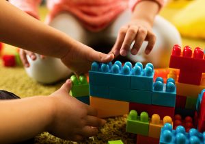 Kids playing with building blocks