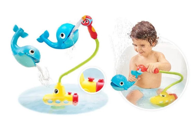 Image showing a kid playing with water toys